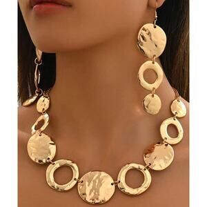 Pierced gold hammered odd shaped round and cutout necklace set